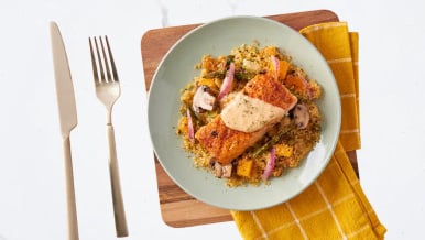 roasted salmon with cider reduction over an apricot and squash quinoa pilaf