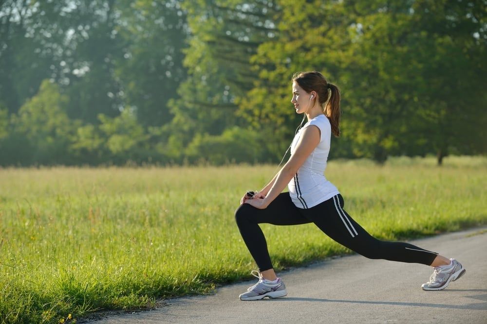 healthy young woman stretching before Fitness and Exercise